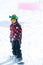 Boy Snowboarding on Mountain