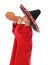 Boy in spanish red shirt and sombrero drinking from bota bag