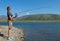 The boy with a spinning catch grayling