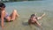 Boy splashing on the beach