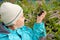 Boy with a sprig of Aronia