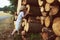 Boy stand near logging