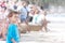 Boy standing alone on fan crowd background