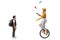 Boy standing and watching a female riding a mono cycle and juggling