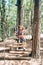 Boy stands on the agility bridge and looks up