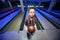 Boy stands with ball for bowling