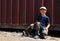 A boy stroking a street puppy - friendship between a child and a dog