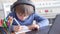 Boy studying home online while school is closed