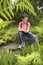 Boy Studying Plants And Writing On Clipboard