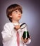 Boy studying a substance in a test tube