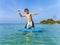 Boy surfing in the sea