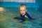 Boy swimming in the pool