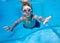 Boy swimming underwater