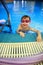 Boy in swimmong pool