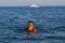 Boy swims and dives in a swimming mask