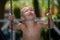 Boy at a swing chair