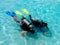 A boy taking scuba diving lessons.