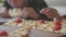 Boy teen and girls eats pizza in cafe slow motion video. children eat pizza a delicious pizza. company of lifestyle