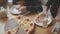 Boy teen and girls eats pizza in cafe slow motion video. children eat pizza a delicious pizza. company of people friends