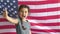 Boy teen shows gesture yes Independence Day American flag usa Fourth of July