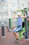 Boy teenager engaged in children`s exercise equipment