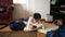 Boy teenager is shirking her homework, playing on her mobile phone. Cleaning of the children`s room. Disorder in the