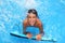 Boy teenager surfboard splashing blue water