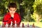 Boy thinking chess game