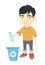 Boy throwing plastic bottle in recycle bin.