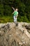 Boy throwing rock