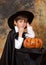 The boy with traditional halloween pumpkin