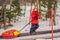 Boy with tubing rises on a travelator to the mountain. Child having fun on snow tube. Boy is riding a tubing. Winter fun