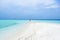 A boy and Umbrella on the beach of Maldives