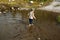 boy wading water pictures