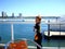 A boy is waiting for his yacht cruise on Gold Coast .. Australia