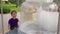 Boy watching cotton candy machine in park