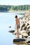 Boy watching lake