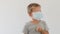 Boy wearing facial disposable mask. Stop coronavirus