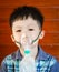Boy wearing oxygen mask.