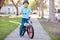 Boy Wearing Safety Helmet Riding Bike