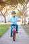 Boy Wearing Safety Helmet Riding Bike