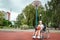 Boy in a wheelchair on the basketball court. Rehabilitation, disabled person, paralyzed, happy disabled child