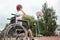 Boy in a wheelchair on the basketball court. Rehabilitation, disabled person, paralyzed, happy disabled child