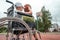 Boy in a wheelchair on the basketball court. Rehabilitation, disabled person, paralyzed, happy disabled child