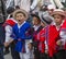 Boy yawns while others look bored during Christmas parade