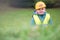 Boy with a yellow builder helmet