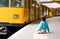 Boy and a yellow train