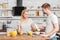 boyfriend proposing milk to skeptical girlfriend