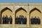 Boys` choir sings in niches of Khaju bridge, Isfahan, Iran.