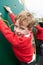Boys On Climbing Wall In School Playground At Breaktime